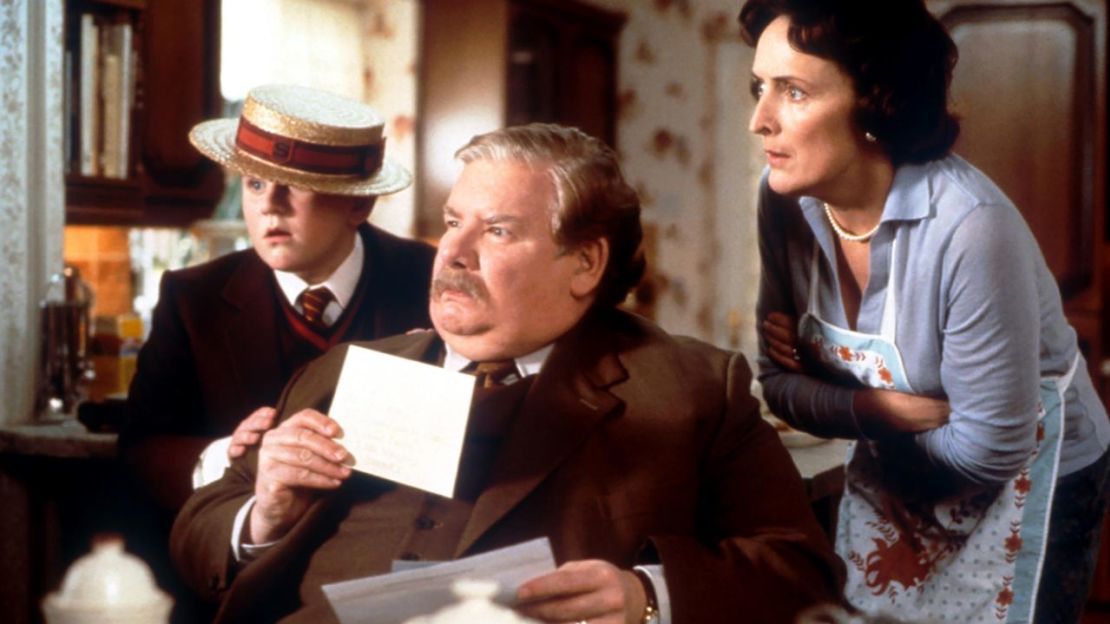 Harry Melling as Dudley Dursley, Richard Griffiths as Vernon Dursley and Fiona Shaw as Petunia Dursley in 